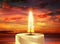 Burning candle, ballerina in flames, sunset background