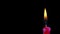 Burning candle on black. burning candle flame  copy space