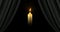 the burning candle and drapery