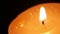 Burning a candle extreme closeup footage