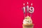 Burning candle number 119 - Birthday card with cupcake