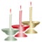 Burning candles in candlesticks