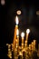 Burning candles on church candlestick