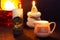 Burning candles near the mirror. Beautiful handmade candles. Cozy atmosphere in the house