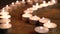 Burning candles. Shallow depth of field. Many christmas candles burning at night. Abstract candles background.