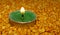 Burning candles Split pea ,Candles on Split pea background,Green candles on the seeds,