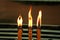 Burning candles for worshiping sacred things according to religious beliefs