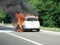 Burning car on highway