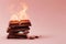 Burning chocolate bar, chocolate on fire. Hot block of chocolate in flames. Burning calories, weight loss and healthy diet concept