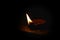 Burning diya in dark night in diwali