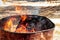 Burning fire in a barrel close-up. Bright flame. Open flame heating. Problems with heating and gas