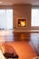 Burning fireplace in cozy interior