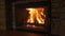 Burning fireplace - a glowing fire in the stone fireplace to warm at night