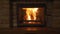 Burning fireplace - a glowing fire in the stone fireplace to warm at night