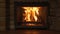 Burning fireplace - a glowing fire in the stone fireplace to warm at night