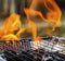 Burning flames over barbecue