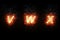 Burning font v, w, x, fire word text with flame and smoke on black background, concept of fire heat alphabet decoration