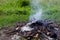 Burning of garbage piles and smoke creates air pollution.