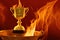 Burning gold trophy cup on dark background, flames around. Concept of success and effort, generative ai