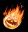 Burning halloween pumpkin in flames on the black background