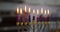 Burning hanukkah candles in a menorah on Jewish festivals