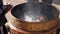 Burning Incense in Cauldron near Buddhist Stupa