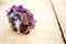 Burning incense cone with amethyst crystal with wafting smoke on