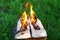 Burning leather sports shoes. Sneakers or gym shoes on fire stand on the Stump.