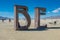 Burning Man, Nevada, USA, September, 6, 2015: Attendees at Burning Man festival standing on and around an artwork of