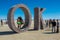 Burning Man, Nevada, USA, September, 6, 2015: Attendees at Burning Man festival standing on and around an artwork of