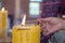 Burning many Incense sticks with large candle