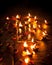 Burning oil lamps. Traditional offering in buddhist and Hindu temple. India