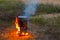 Burning portable wooden stove with a cauldron