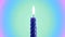 Burning and rotating blue candle with burning flame