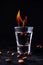 Burning Sambuca in Glass with Coffee Beans on Dark Background. Concept Shot Alcohol Cocktails