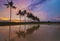 Burning Sunset with Reflection of tropical tree.