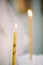 Burning thin candle during christening