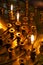 Burning warm candles at a ceremony in the temple.