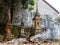 Burning waste at the ossuary at a Buddhist monastery