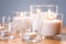 Burning white fragrance candles on wooden table