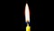Burning wick of a church candle on a black background