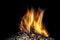 Burning wood pellets, living flame