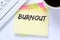 Burnout ill illness stress stressed at work business desk