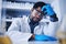 Burnout, stress and scientist black man with a headache during medical research in a lab or laboratory frustrated and