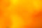 Burnt amber and orange soft blurred background.