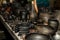 Burnt black ceramics. Burnt clay pots and plates, dishes - Image