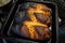 Burnt bread when baking on a black baking tray