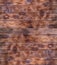 Burnt brown wood planks close-up for background