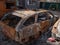 Burnt cars on city streets