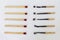 Burnt matchsticks and new matchsticks on white background. Different stages of matchsticks.